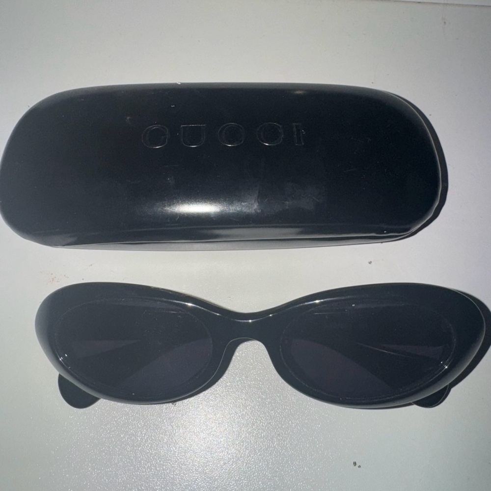 Gucci Black Oval Sunglasses
